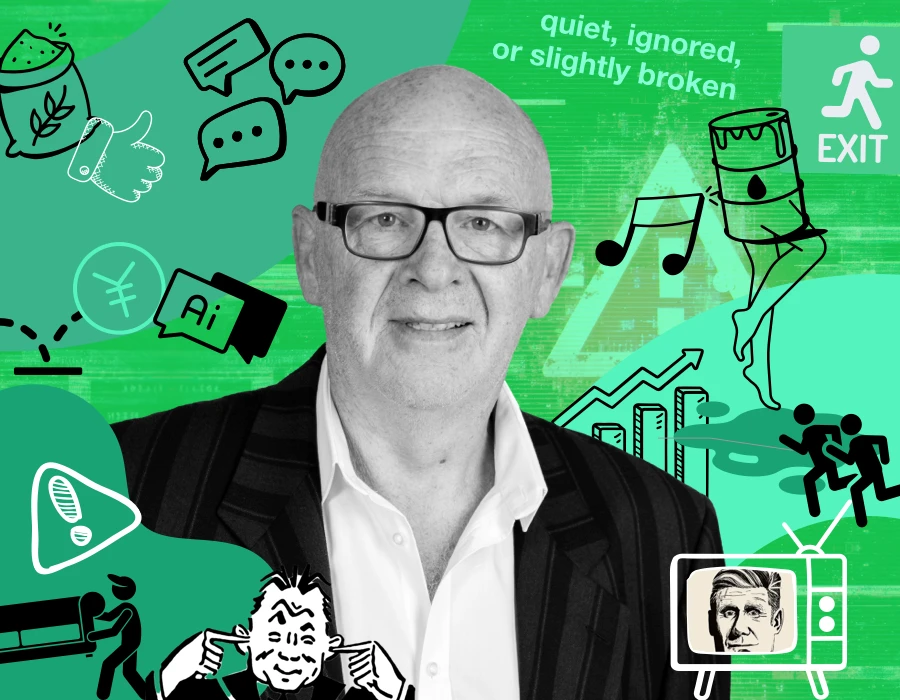 Smiling bald man in a suit amid a green collage of business and tech icons (speech bubbles, charts, exit sign, TV, music notes).